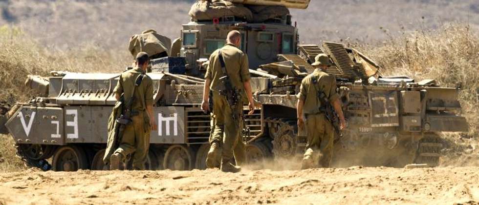 File picture shows Israeli soldiers in a training field in the Golan Heights, next to the Israeli-Syrian border ( Jack Guez (AFP/File) )